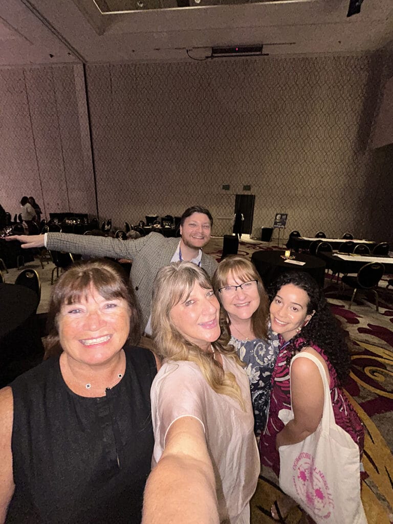 This image has an empty alt attribute; its file name is 2025-Conference-Group-3-768x1024.jpg