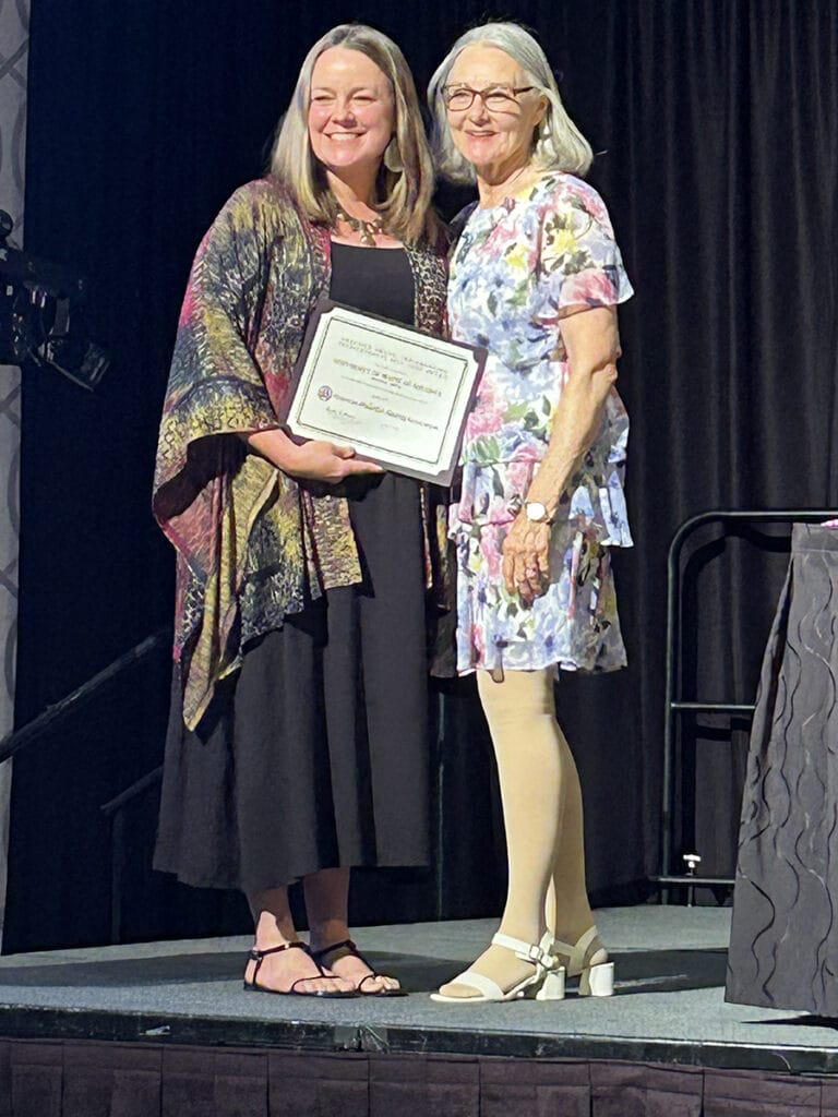 This image has an empty alt attribute; its file name is Amanda-Thaller-Award-768x1024.jpg