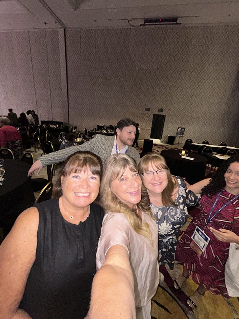 This image has an empty alt attribute; its file name is Conference-Group-2-768x1024.jpg
