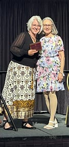 This image has an empty alt attribute; its file name is Jane-Receiving-Award-2.jpg